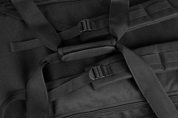 Close-up of a black backpack straps on the trolley bag and zippers